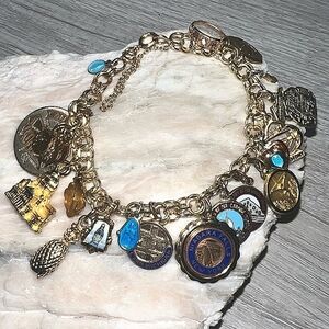 12k gold & sterling silver loaded charm bracelet! Beautiful, unique charms.